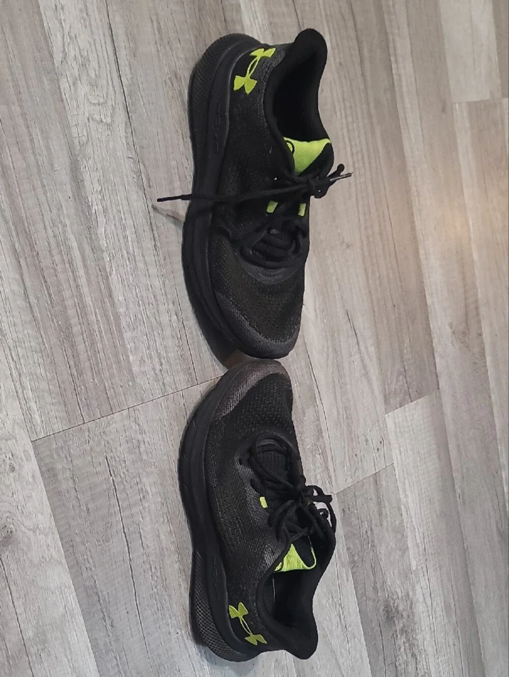 Under Armour Men’s Black Running Shoes with Neon Green Accents